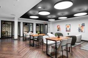 Madison apartment for rent - a large room with tables and chairs